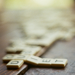 scrabble tiles spelling "Quiet"