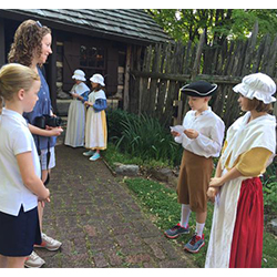 Kids dressed as pioneers